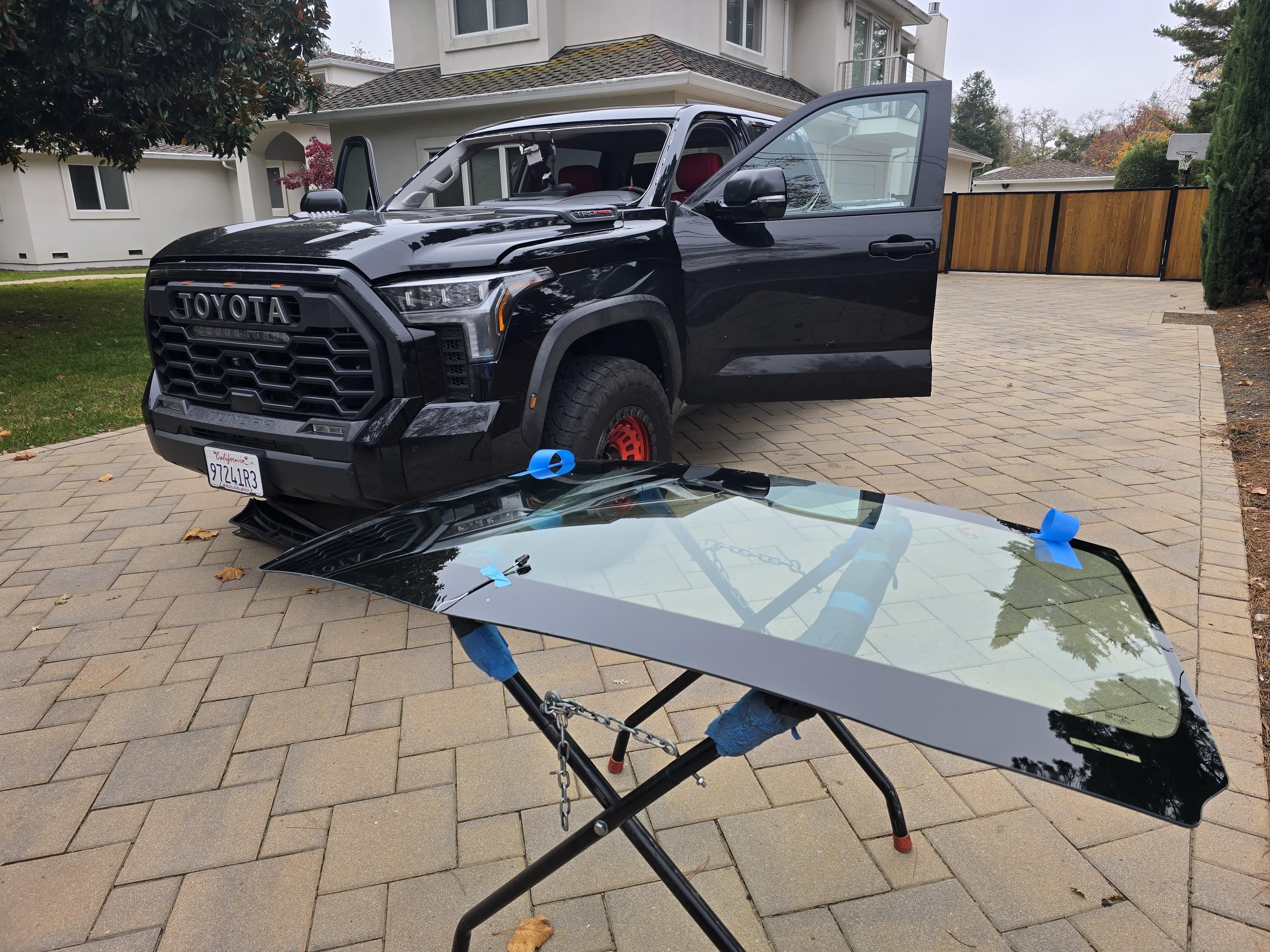 Black Toyota Tundra TRD Pro with windshield removed during mobile windshield replacement service by Walnut Creek Auto Glass